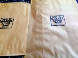 Our own packaging – brown paper bag with black ink stamp.
